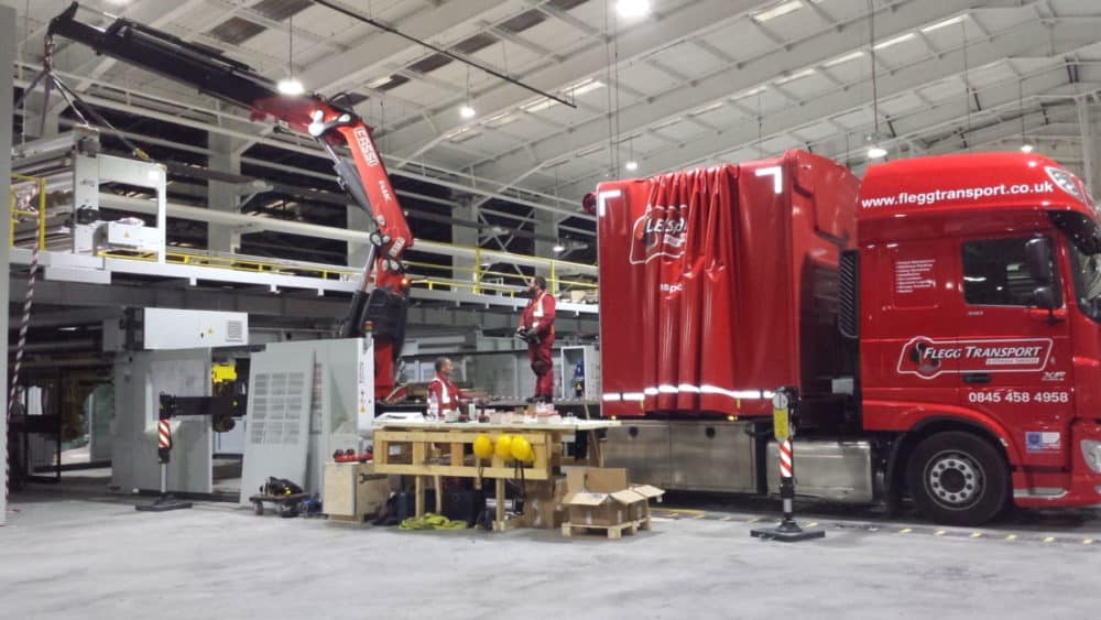 lifting with a crane on the back of a lorry